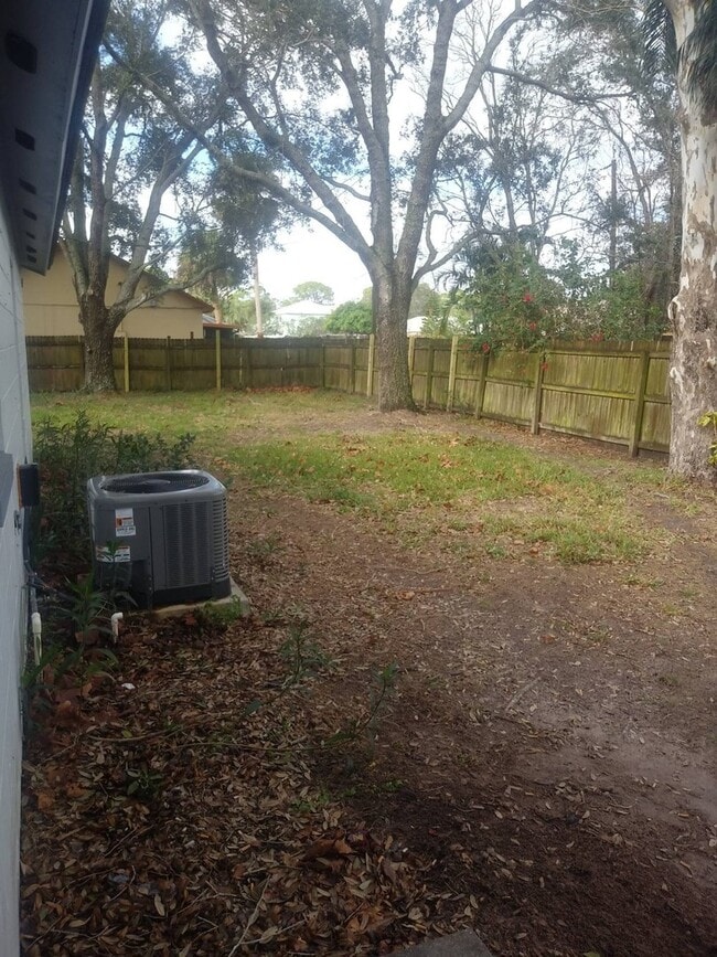 Building Photo - Cozy and Roomy! Nice corner lot home 2 Bedrooms 2 Baths with 1 car garage and huge backyard. Pets...