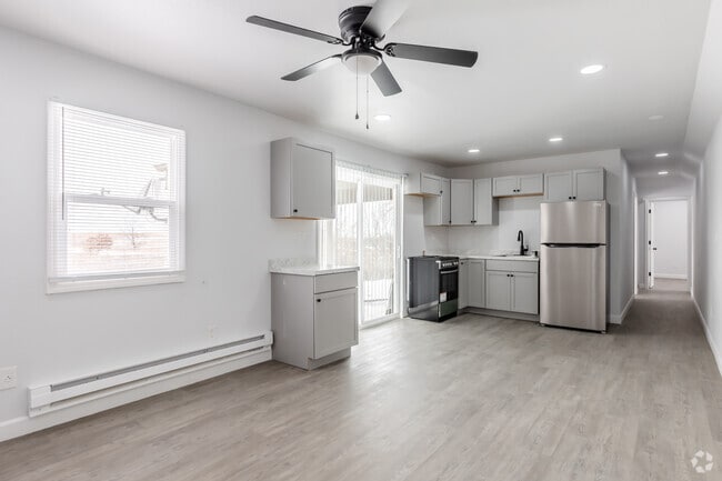 3BR, 2BA - 950SF - Kitchen/Dining/Living