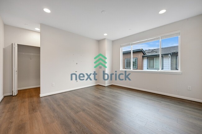 Photo - A Beautiful Corner Home Designed for Comfort, Light & Community!