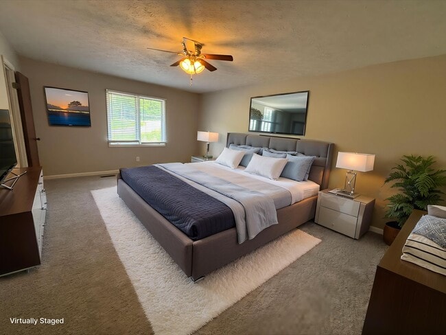 Elevate your living at Guest House with this spacious, sunlit bedroom featuring modern design and cozy furnishings. Enjoy comfort and style with ample natural light. Schedule your tour today to see all that awaits you!