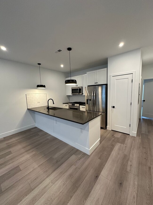 Photo - ONE FREE MONTH RENT: 3 bedroom 3 bath Newer construction home offers perfectly blends comfort, st... Unit 2