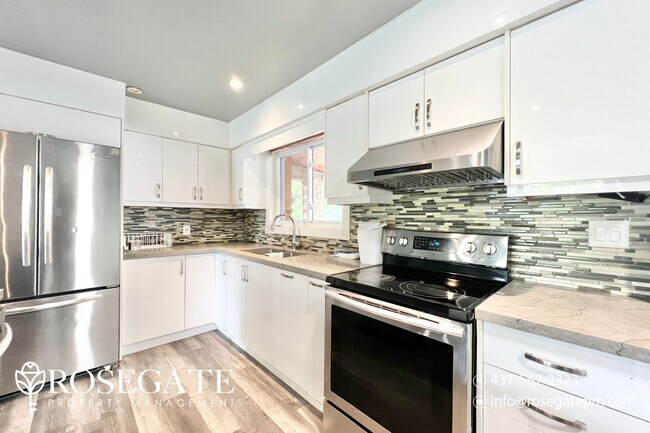 Photo - Spacious 5-Bedroom, 2-Bathroom Home in Kit...