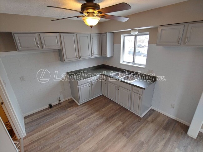 Photo - Freshly painted 3 bedroom with new flooring throughout!