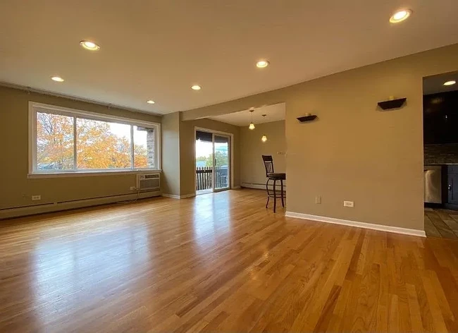 Sunny living room - 940 E Old Willow Rd Unit Apartment 308