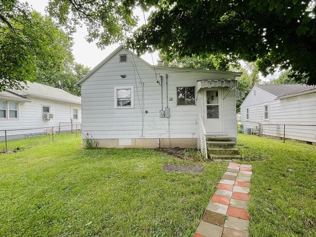 Photo - Garage and Fence