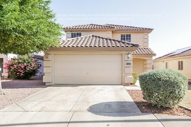 11718 W Laurel Ln