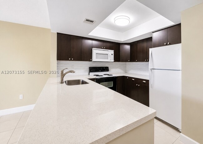 Building Photo - 9285 SW 125th Ave Unit 306