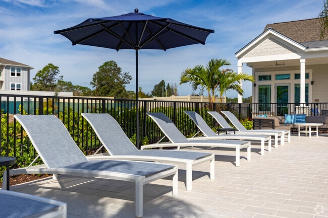 Sundeck Lounge Chairs - The Pointe at Palm Bay