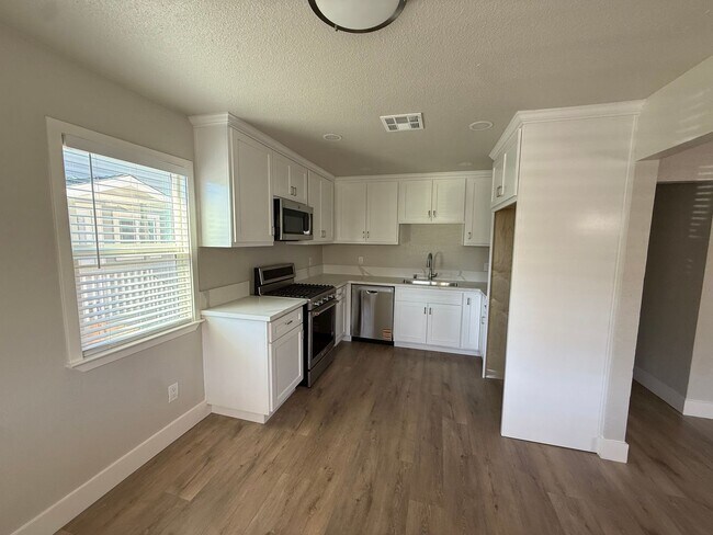 Photo - 3 Bed| 2 Bath | 864 SF | Private Driveway | Single Story | Tenant pays $175 monthly for WS&G