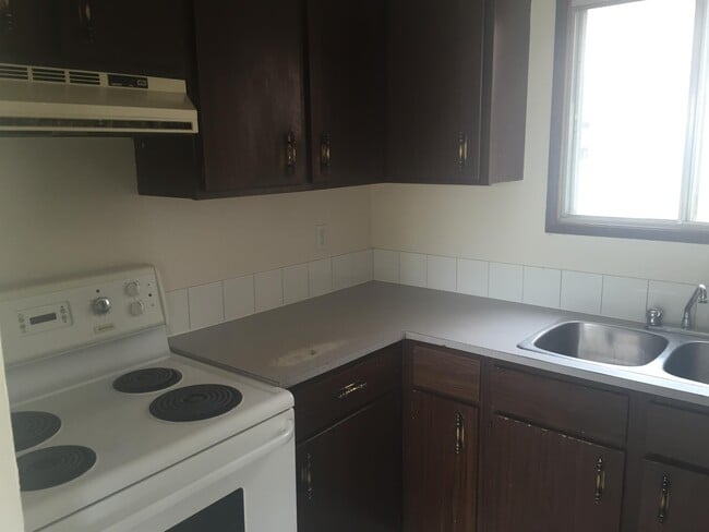 Building Photo - 8911-8102 102 Ave