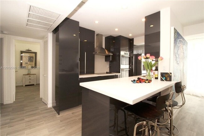 Building Photo - 17560 Atlantic Blvd Unit 201