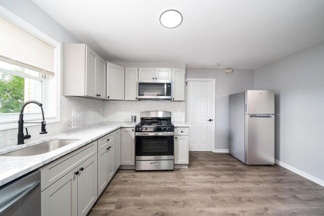 Building Photo - 9009 Durham Ave Unit 2