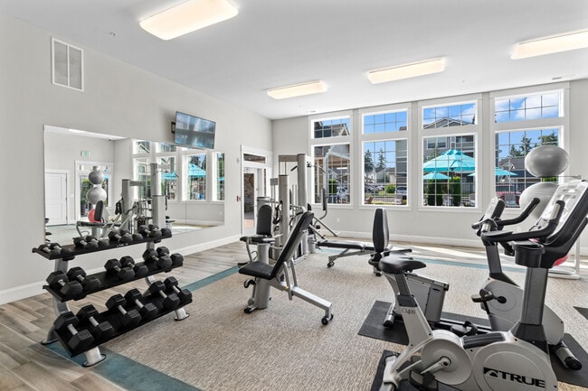 Cintas de correr y bicicletas estáticas | Apartamentos de lujo en Puyallup, WA | Silver Creek - Silver Creek Apartments