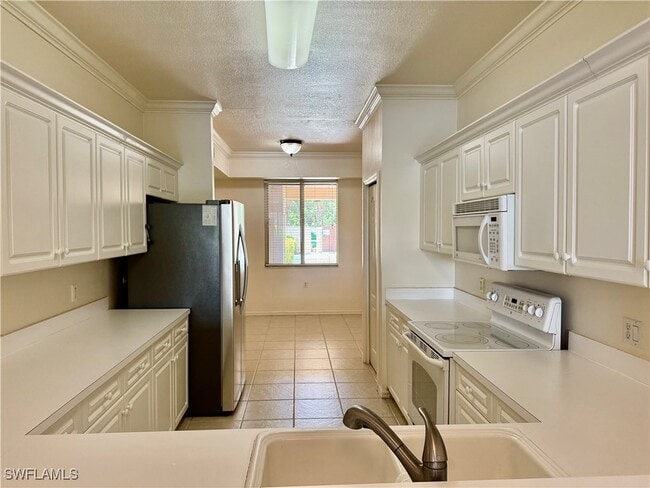 Building Photo - 8450 Kingbird Loop Unit 412