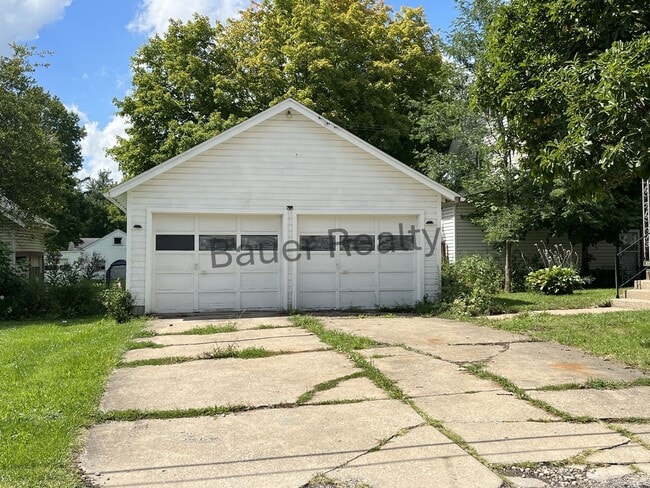 Photo - Three bedroom home with two car, detached garage!