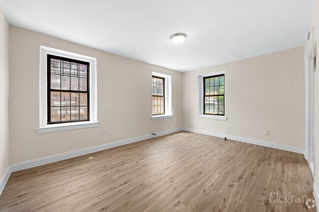 Building Photo - 37-51 79th St Unit APT 1C