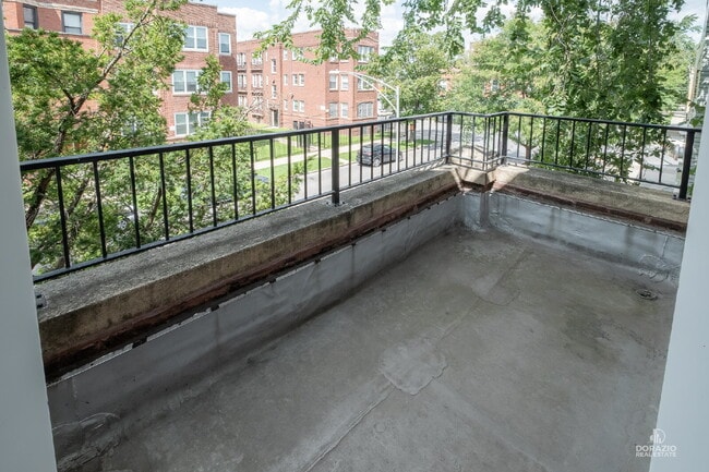 Photo - Modern 4BR Apartment with Hardwood Floors, Balcony & Central A/C Unit 2