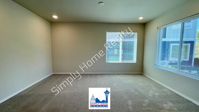 Photo - Step Inside to a Townhome Made for Easy Living!