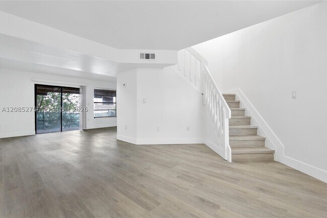 Building Photo - 5796 W 26th Ave Unit 205