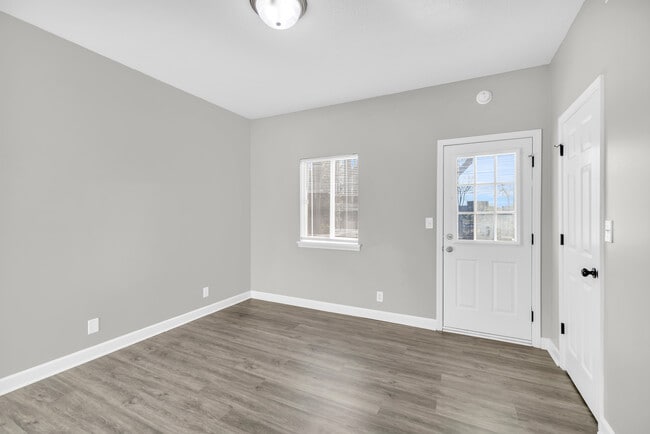Bedroom with Rear Door to Private Deck - Lander Place Apartments- 611 Highland Park Dr