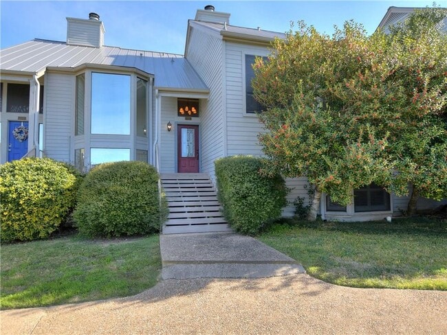 Photo - 120 World of Tennis Sq Condo Unit 118C