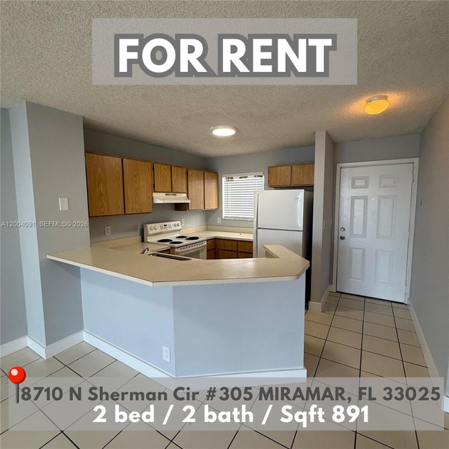 Building Photo - 8710 N Sherman Cir Unit 305