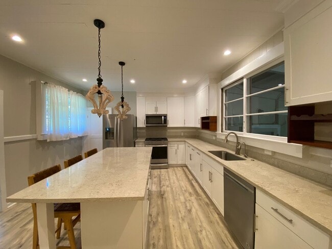 Photo - Furnished Plantation Home with 3 Bedrooms, 2 Bath large enclosed porch on almost 2 acres with oce...