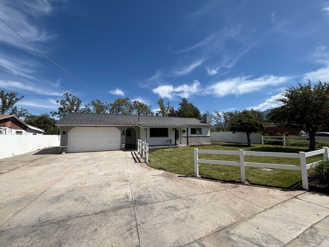 Building Photo - Beautifully Renovated 4-Bedroom Home with Finished Basement