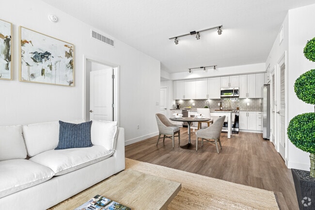 2BR, 2BA - 1,158SF - Living Room / Dining Room