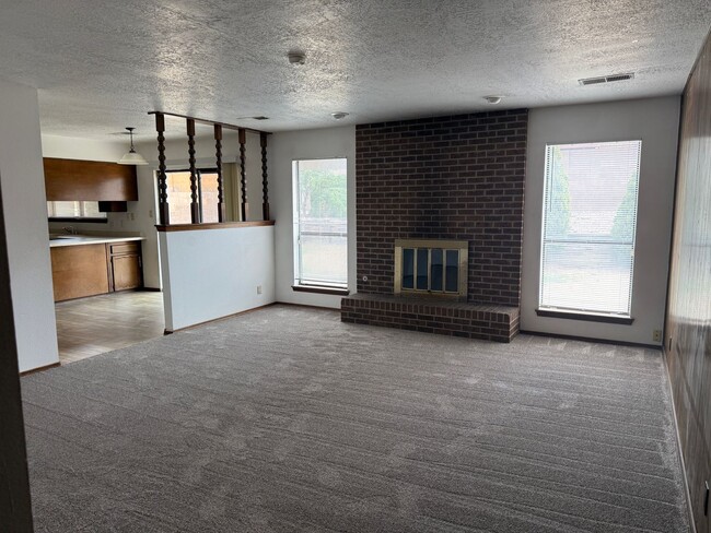 Photo - 4 Br, 1.75 Ba, 2 living areas, formal dining room, 2 CG, nice yards, storage shed