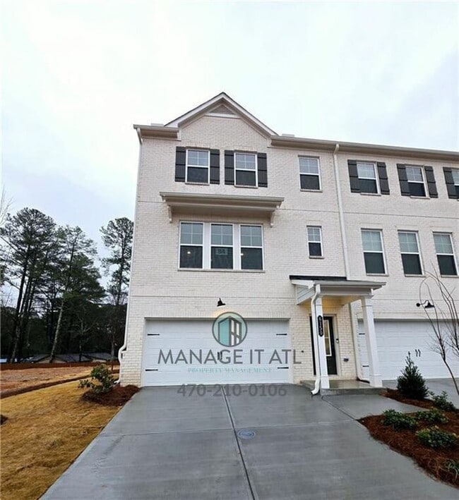 Building Photo - Beautiful End-Unit three-story townhome in Tucker