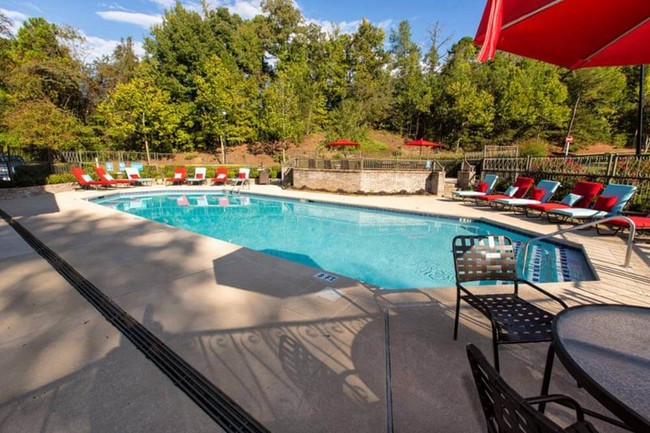 Pool with Sun Deck - The Retreat at Rocky Ridge Apartments