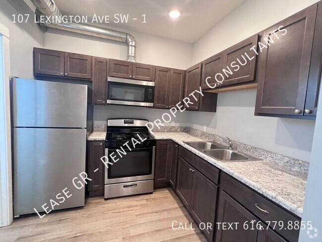 Building Photo - Updated One Bedroom Apartment! SW Side! Unit 1