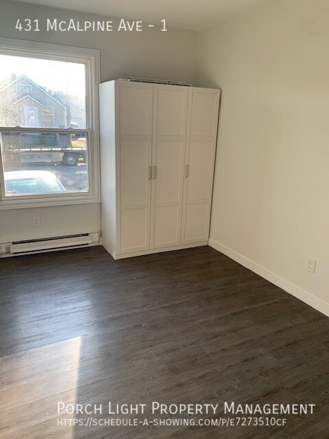 Photo - Main Floor With Parking, Laundry, Yard and Plenty of Storage Unit 1