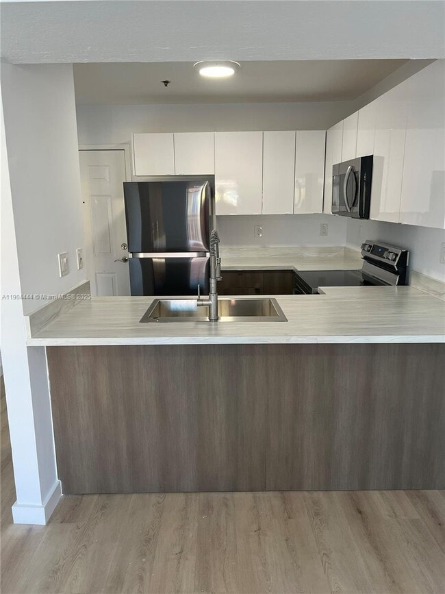 Building Photo - 9720 SW 184th St Unit 209