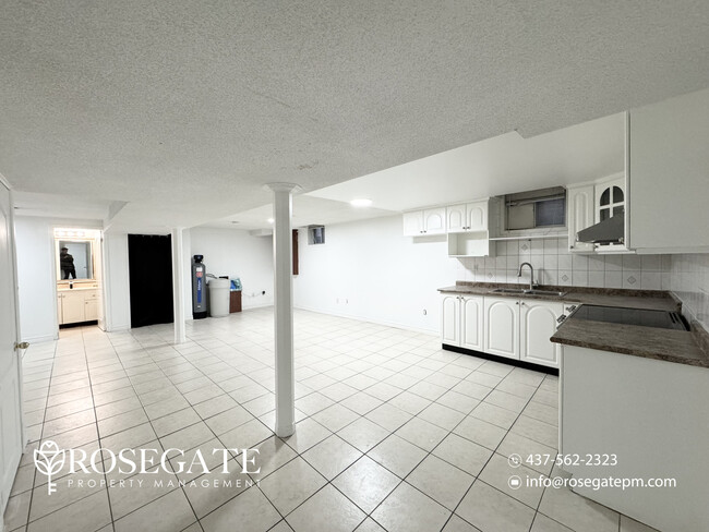 Photo - Spacious 2-Bedroom Basement Apartment with... Unit 2