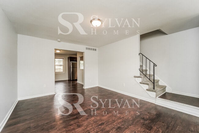 Photo - This highly desirable 4 bedroom, 2 bathroom home is ready for your personal touch!