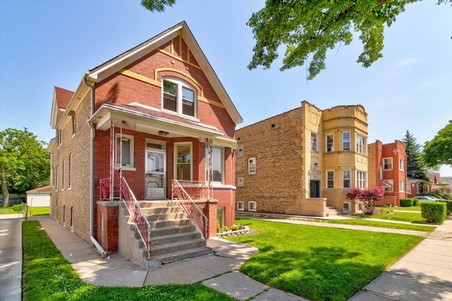 Building Photo - 4912 W Cornelia Ave Unit 1