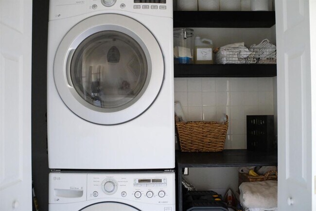 LG front-loading washer/dryer with folding area - 2036 Pinecrest Dr