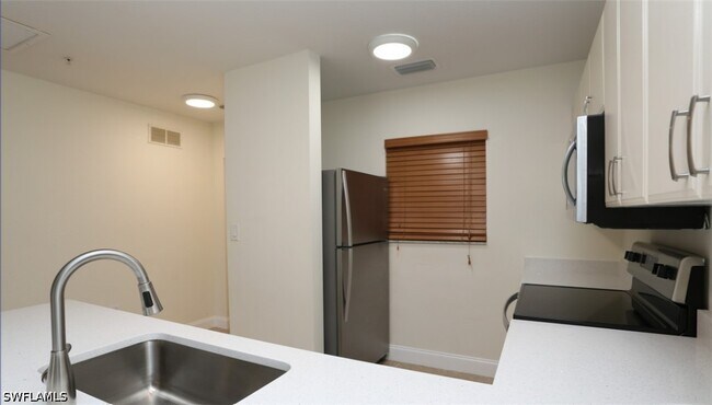 Photo - 4455 Botanical Pl Cir Unit 5-104