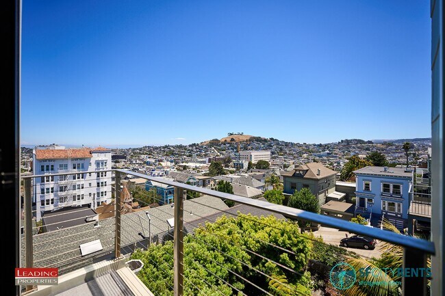 Photo - Noe Valley: Top Floor Condo w/ City Views, Garage Parking & W/D in unit Unit 1185 Dolores St #2