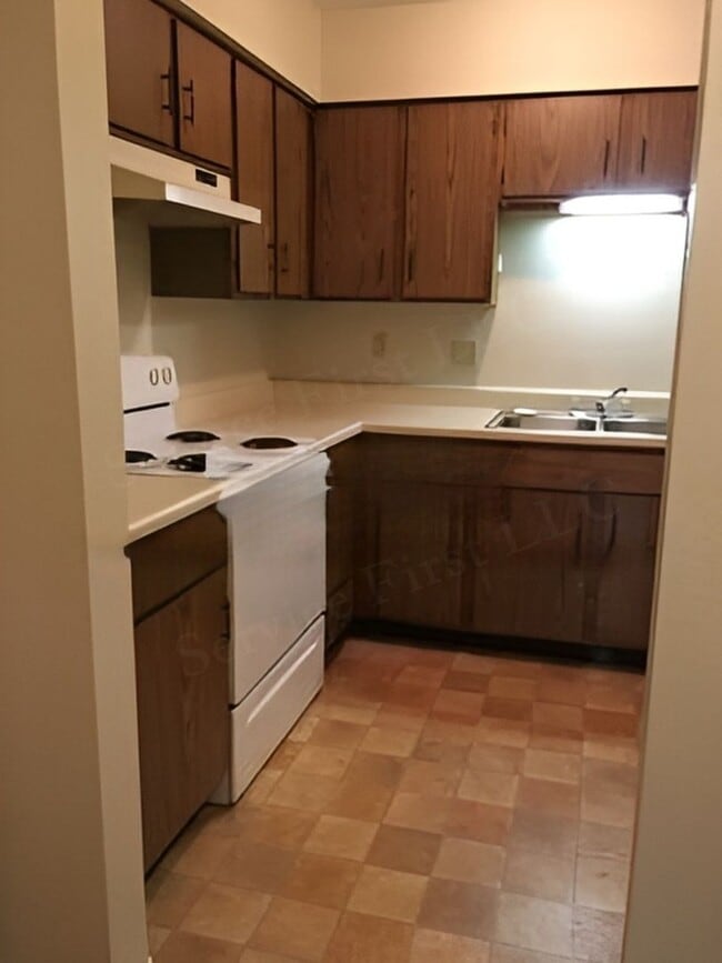 Building Photo - Buffalo Apartments (Bison Terrace) Unit 201 (103)