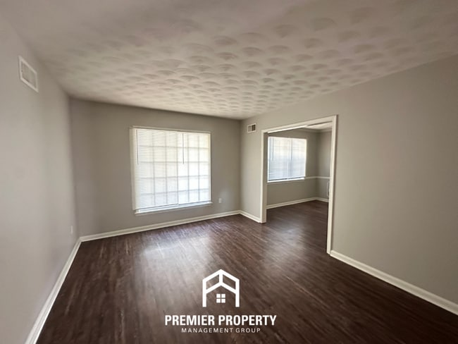 Photo - Spacious 4BR/2BA Memphis Rental with 2-Car Garage, Hardwood Floors & Fireplace