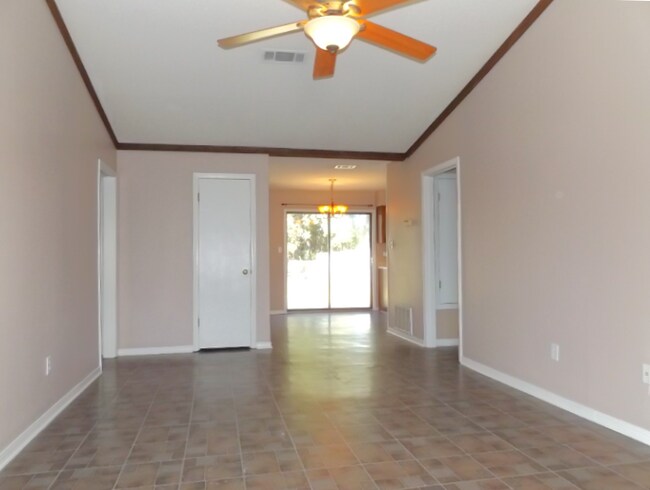Photo - -Bed, 1.5-Bath Duplex in Bellview with Garage, Indoor Laundry, and Private Fenced Backyard