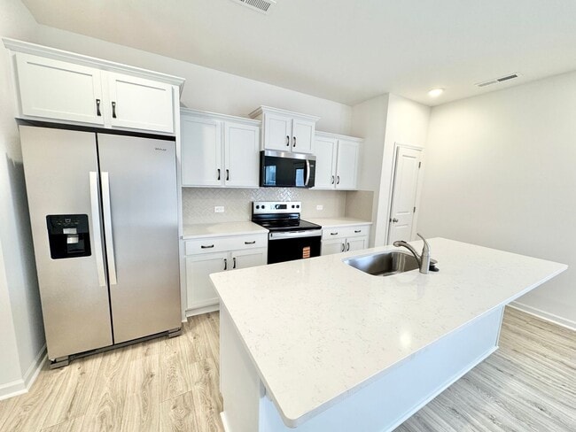 Photo - New 3 br home with loft area and 2 car garage