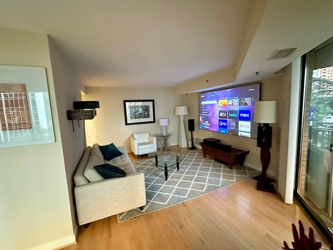 living room from alternate entrance - 7500 Woodmont Ave Unit 407