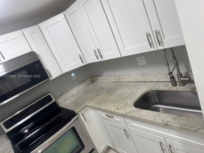 Building Photo - 1796 NW 55th Ave Unit 101