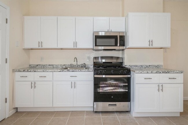 Building Photo - 68 Rose Ave Unit 1L Rental