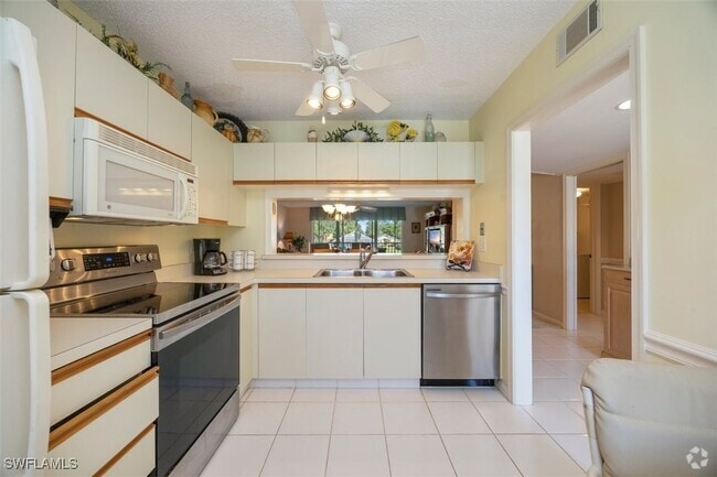 Building Photo - 5980 Amherst Dr Unit D202 Rental