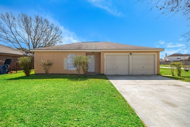 Building Photo - Lovely 4 Bedroom 2 Bath 2 Car Garage home with Large, Privacy Fenced Backyard!! Fresh Paint, Cera...